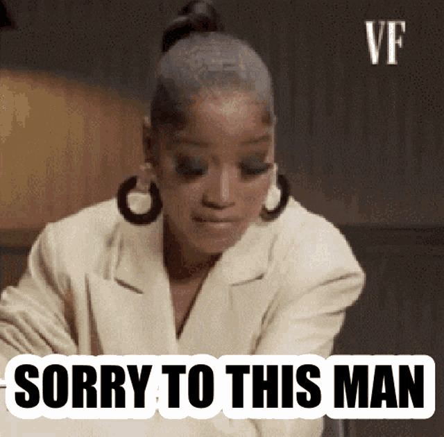 Keke Palmer, in a white business jacket, flips a page and says "Sorry to this man"